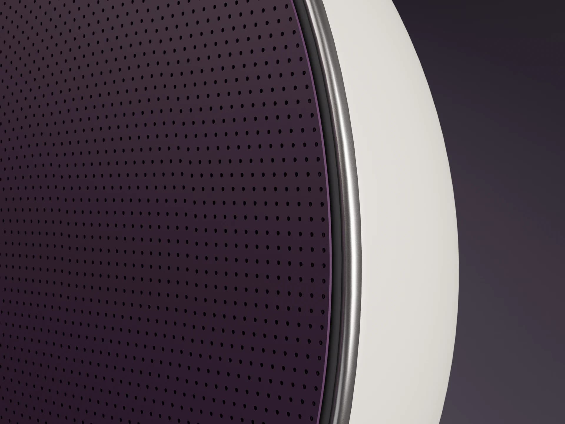 Aubergine perforations meeting the silver rim and chalk shell